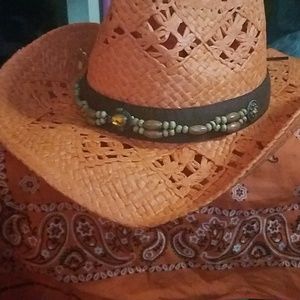A orange cowgirl hat